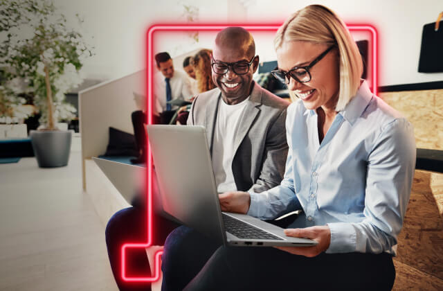Let People Succeed - woman and man sitting with laptop on stairs - desktop